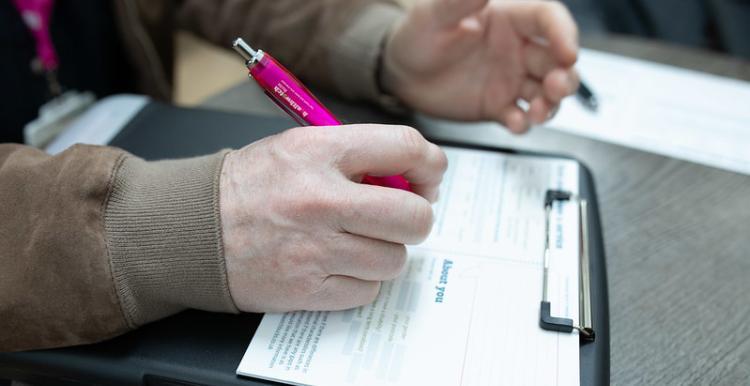 Person Filling in a form