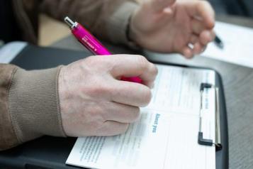 Person Filling in a form